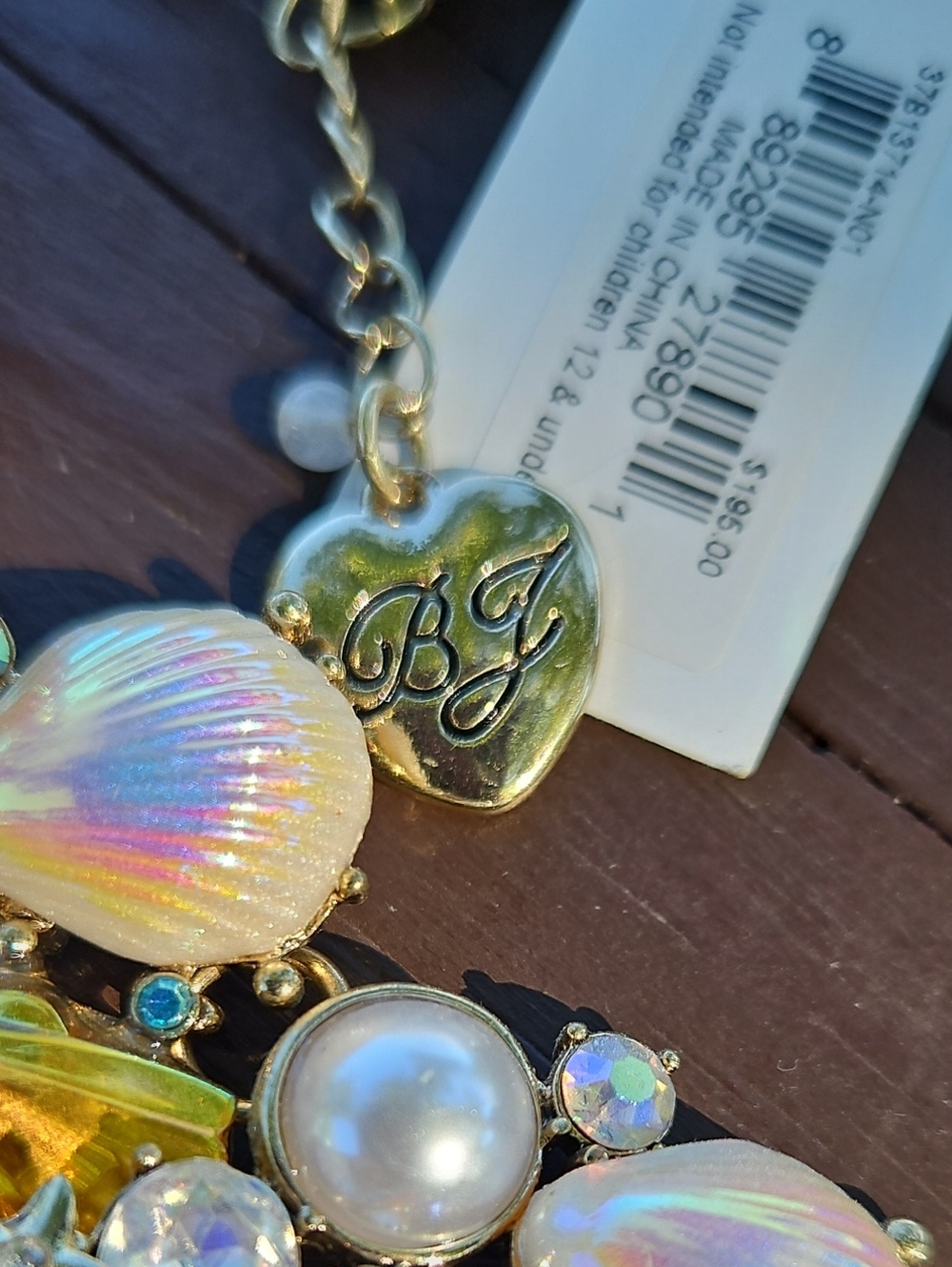 Betsey Johnson Iridescent Pearl Shell Necklace with Blue Star Accents - Picture 6 of 8
